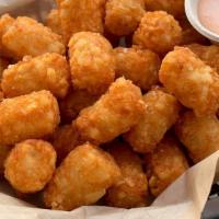 Crispy Tots · Served with a smokey ranch sauce.