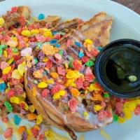 Pebbles Toast · Vegetarian. Our welcome toast with a condensed milk glaze and fruity pebble bits