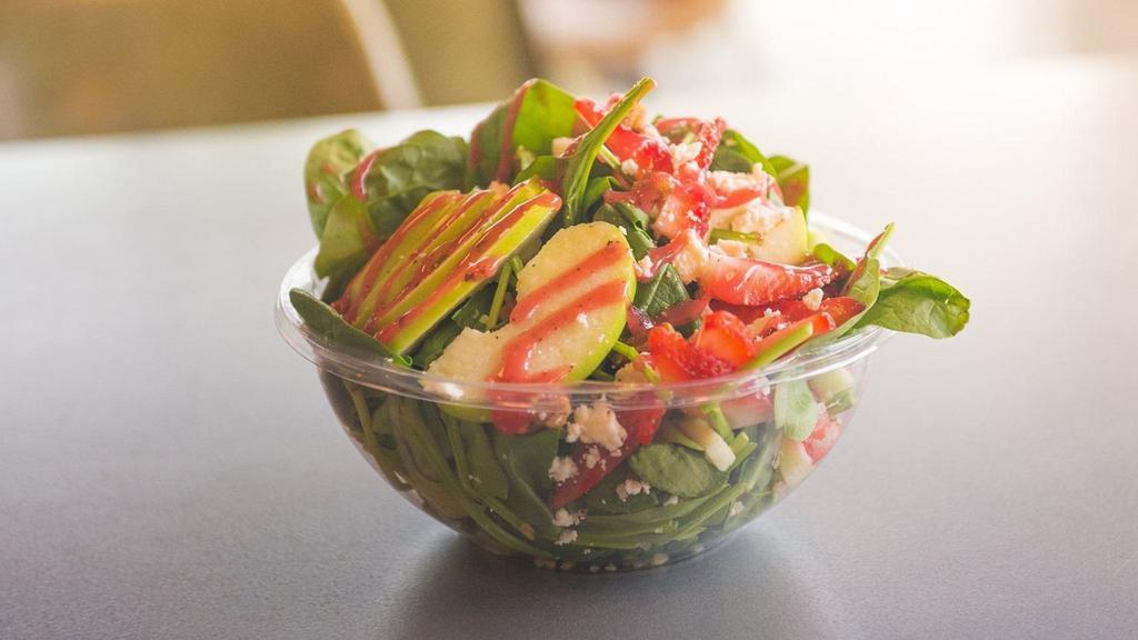 Strawberry Apple · Spinach, arugula, strawberries, feta cheese, apples, candied pecans, quinoa. Your choice of creamy poppyseed or raspberry vinaigrette dressing.