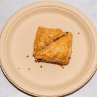 Baklava · Our thin, flaky dessert pastry filled with crushed almonds, walnuts and honey.