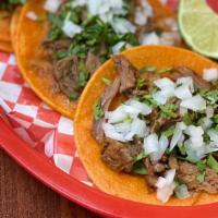 Birria Street Tacos (Each) · Birria served on two small corn tortillas. Topped with onion and cilantro, served with lime....
