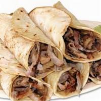 Tacos Arabes (Each) · Seasoned pork and grilled onions served inside a flour tortilla.