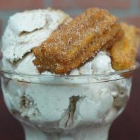 Horchata Ice Cream · Cinnamon rice milk ice cream, served with churro bites.