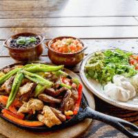 Fajitas · Seasoned and Sauteed peppers and onions with your choice of Grilled Steak, Chicken or Shrimp...