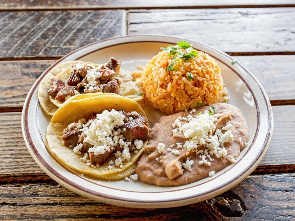 Kids Tacos · Two soft tacos with your choice of protein, served with rice and your choice of beans.