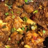 Raju Gari Kodi Vepudu (Chicken Roast) · Special chicken sautéed with homemade spices and cashewnut.