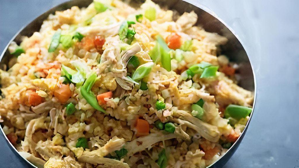 Chicken Fried Rice · Indo Chinese style fried cooked in a special pan with  chicken pieces.
