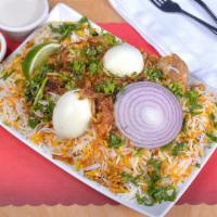 Godavari Kodi Biryani (Special Chicken) · Basmati rice cooked with fresh herbs, spices and simmer tender morsels of chicken.