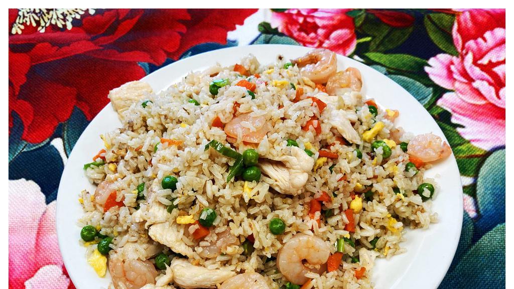  Egg  Fried Rice  · Egg fried rice with scallions.