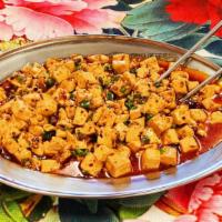 Mapo Tofu · Hot. Tofu with pork served in spicy Sichuan sauce.