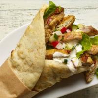 Halal Chicken Gyro · Pita Bread filled with Grilled Chicken seasoned in our special of Mediterranean spices with ...