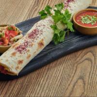 Beef & Lamb Saj · Roasted Lamb & Beef seasoned in our special of Mediterranean spices with lettuce, tomato, an...