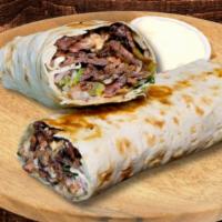 Lamb Burrito · Roasted Lamb and rice seasoned in our special Mediterranean spices with lettuce, tomato, and...