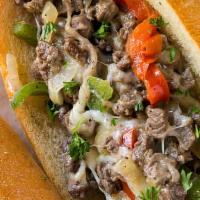 Philly Chesse Steak  · Roasted beef steak seasoned chicken cooked with fresh onion, green peppers cooked and coated...