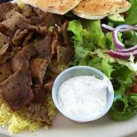Lamb Plate  · Roasted Lamb placed on a bed of basmati rice and our homemade Mediterranean TZATZIKI SAUCE H...
