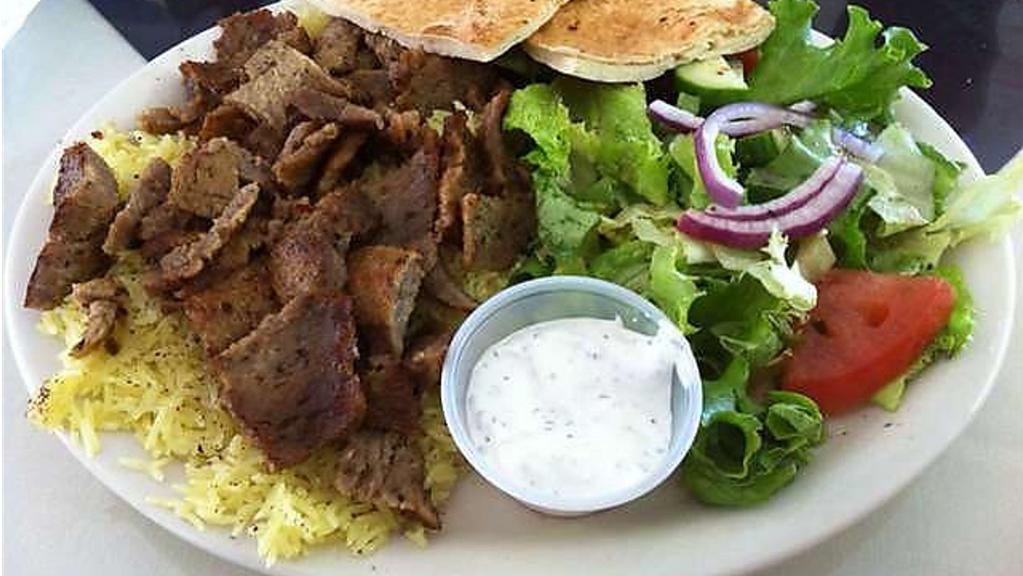 Lamb Plate  · Roasted Lamb placed on a bed of basmati rice and our homemade Mediterranean TZATZIKI SAUCE Homemade Hummus sauce and green salad served with pita bread and homemade hot sauce in option