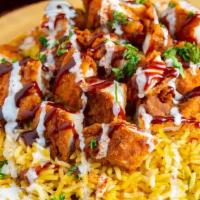Chicken Zinger Plate · Grilled seasoned homemade SPICY chicken shawarma placed on a bed of basmati rice and our hom...