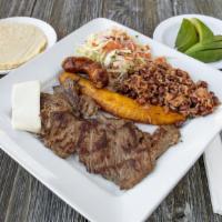Churrasco Salvadoreño · Grilled steak served with gallo pinto rice mixed with beans cabbage salad salvadoran sausage...