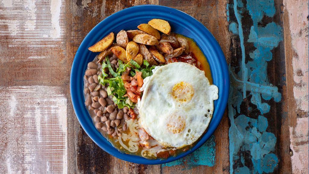 Carne Adovada Huevos Rancheros* · Two eggs, white corn tortillas, carne adovada, white cheddar, Range fries, pinto beans, choice of chile.

Consuming raw or undercooked meats, poultry, seafood, shellfish, or eggs may increase your risk of foodborne illness.
