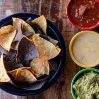 Chips & Dips · Blue and white corn chips. Choice of dips