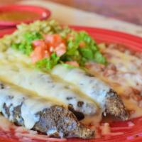 Blue Corn Relleno Plate · Our famous blue corn encrusted new Mexico green chiles stuffed with white cheddar cheese ser...