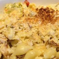 New Mexico Mac & Cheese · Our secret cheese sauce, green chile, bread crumbs.
