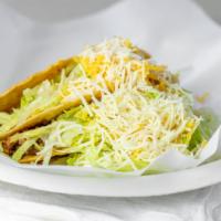 (3) Ground Beef Tacos · With shredded cheese and lettuce.