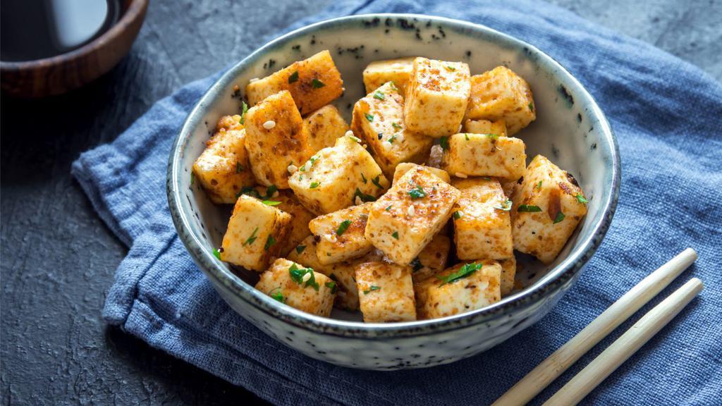 Crispy Tofu · Eight pieces of fried tofu. Served with House-made Sweet and Sour Sauce.