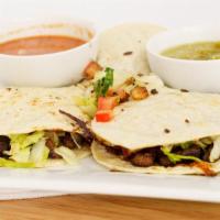 Mulitas (3). · Served in corn tortillas with cheddar monterrey jack cheese heated up in the grill till chee...