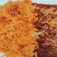 Side Of Rice And Beans. · Rice and beans topped with cheddar/monterrey jack chesee.
Sides of red and green salsa