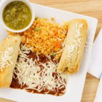 Tamales With Side Of Rice&Beans. · Tamales served with rice and beans with cheddar/jack cheese on top,your choice of chicken or...