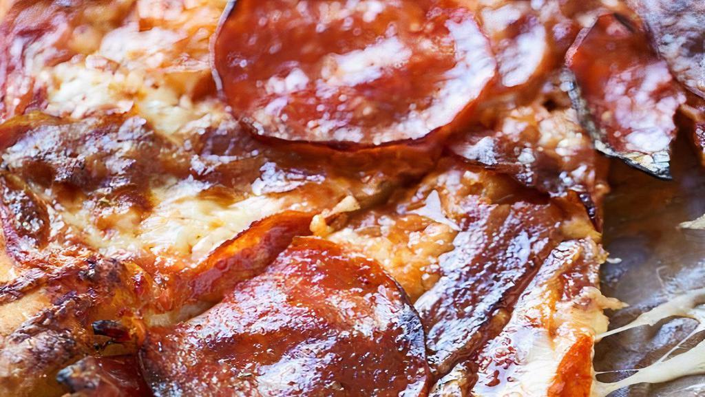 The Perfect Pepperoni & Bacon Pizza · Authentic Neapolitan-style pizza topped with San Marzano tomato sauce, a blend of italian cheeses, and pepperoni, and bacon.