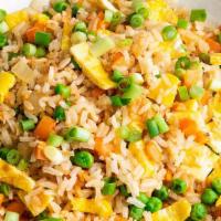 Fried Rice · Rice stir-fried with peas, carrots, onions, scrambled egg, and your choice of protein.