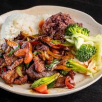 Chili Beef · Marinated ribeye stir-fried with onions, green onions, peppers, dried chili in savory sauce.