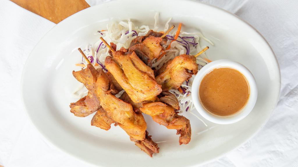 Chicken Satay (4Pc) · Marinated chicken on skewers; served with peanut sauce.