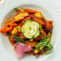 Sweet & Sour Chicken · Breaded or non-breaded chicken with pineapple, carrots, onions, tomatoes, and cucumbers in s...