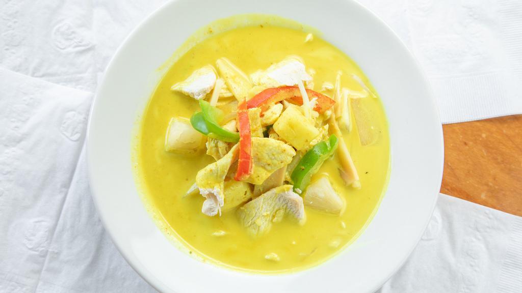 Pineapple Curry · Gluten free. Coconut milk, bell peppers, onions, bamboo, lime leaf, and pineapple.