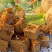 Deep Fried Tofu · Deep fried tofu chunks, served with our gourmet homemade teriyaki sauce, steamed rice, and s...