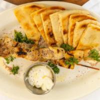 6 Skewers · Choice of chicken, pork, lamb-pork or veggie served with a pita and choice of tzatziki or ha...