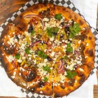 Greek Pizza · Lamb, kalamata olives, onions, pepperoncinis and feta.
