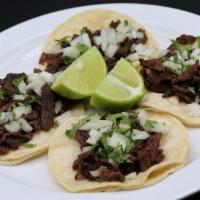 Tacos · Your choice of meat, onions, and cilantro.