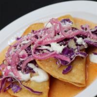 2 Potato Hard Tacos · Served with diced cabbage, lime pickled onion, cotija cheese, sour cream, and warm tomato ju...
