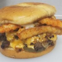 Deluxe Cheeseburger · 2 smashed Premium Angus Beef patties, 2 slices of American cheese, Seasoned fries, bacon, Ma...