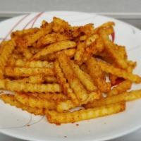 Seasoned Fries · Crinkle fries seasoned with spicy red pepper, garlic, paprika, sugar, spicy red pepper, garl...