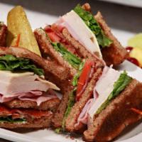 Combo Club Sandwich · Three pieces of toasted bread with center cut bacon, Swiss cheese, lettuce, tomato, and mayo...