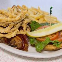 Dce Burger · Dave's Cheeseburger Extreme- a fresh 1/2 lb burger patty topped with cheddar cheese, BBQ sau...