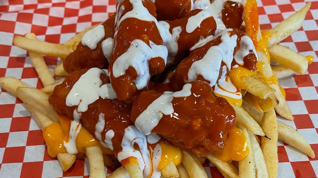 Buffalo Chicken Cheese Fries · Buffalo chicken, and nachos cheese on top of fries, and ranch.