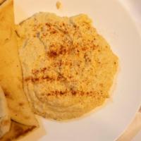 Hummus · Chickpeas, water, tahini, olive oil, kosher salt, garlic, critic acid and arabica pita.