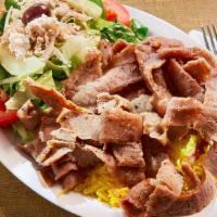 Gyros Plate · Gyros (beef and lamb), Kalos's hummus,  rice , (Greek salad or vegetable)  pita, and  Kalos'...