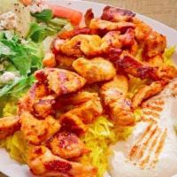 Chicken Shawarma Plate · Seasoned chicken breast, Kalos's hummus, rice, (Greek salad or vegetable), pita. and sauce.